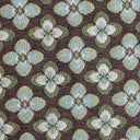 Detaljbild av Dalia möbeltyg med retroinspirerat blommönster i grönt, creme och brunt