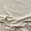Enfärgat tyg Håkan i 90 % polyester och 10 % rami, mjuk textur med naturligt fall, stilrent tyg för gardiner och inredning.