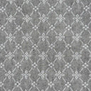 Dubbelvävt möbeltyg Ines i grå nyans med ett diskret geometriskt mönster. Den täta väven och den klassiska designen gör tyget lämpligt för möbler och heminredning.