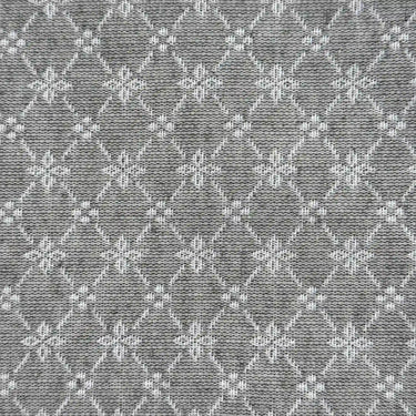 Dubbelvävt möbeltyg Ines i grå nyans med ett diskret geometriskt mönster. Den täta väven och den klassiska designen gör tyget lämpligt för möbler och heminredning.