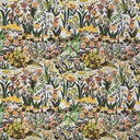Blommigt möbeltyg i gröna, gula och orange toner med detaljrikt naturinspirerat mönster