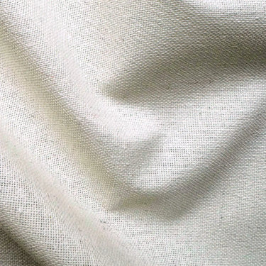 Närbild av offwhite vaxduk med linnelook som visar den textilliknande strukturen.