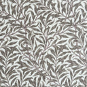 Beige Ramas vaxduk med William Morris-inspirerat bladmönster på ljus botten.